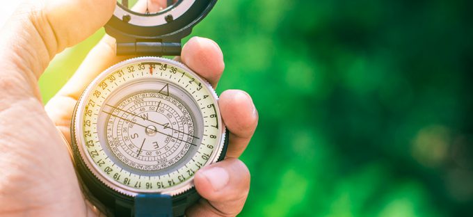 Man navigating with compass